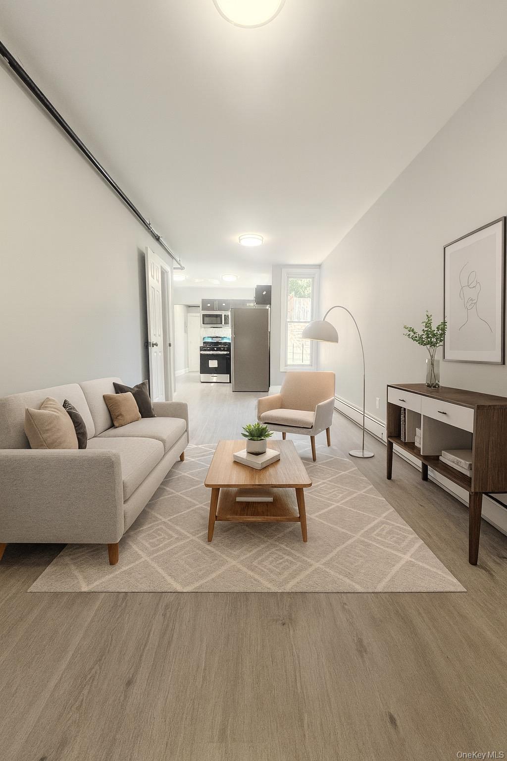 a living room with furniture and a lamp