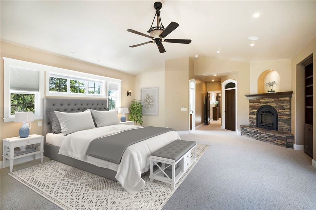 3731 Royal Mountain Road Oroville, CA 95965 - Photo 16 of 67 a bed room with a bed and a fireplace
