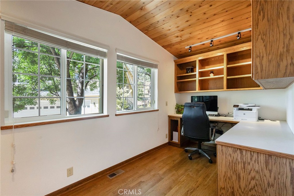 3731 Royal Mountain Road Oroville, CA 95965 - Photo 28 of 67 a view of a workspace with furniture and a window