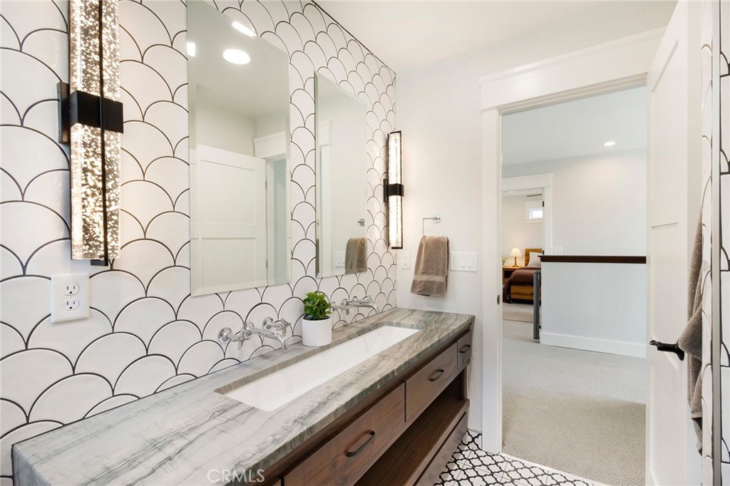 3731 Royal Mountain Road Oroville, CA 95965 - Photo 36 of 67 a bathroom with a granite countertop sink and a mirror