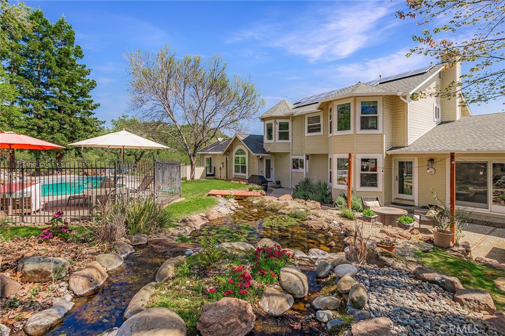 3731 Royal Mountain Road Oroville, CA 95965 - Photo 44 of 67 a view of a house with a yard