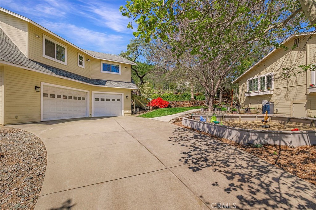 3731 Royal Mountain Road Oroville, CA 95965 - Photo 59 of 67 a front view of a building with large trees