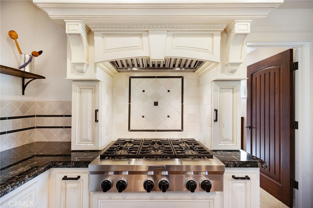 3731 Royal Mountain Road Oroville, CA 95965 - Photo 8 of 67 a white stove top oven sitting inside of a kitchen