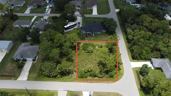 an aerial view of residential house with outdoor space