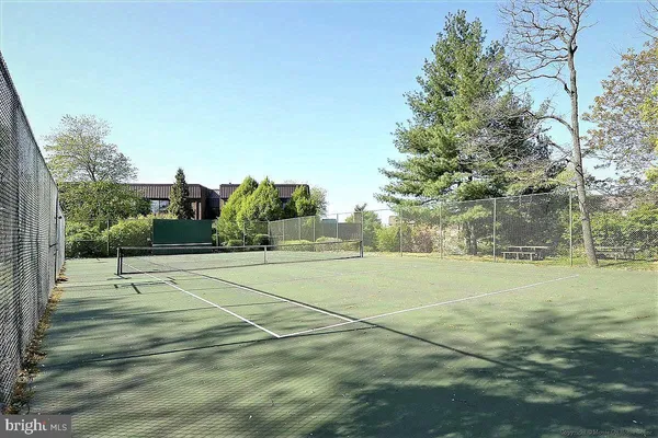 a view of outdoor space and tennis court