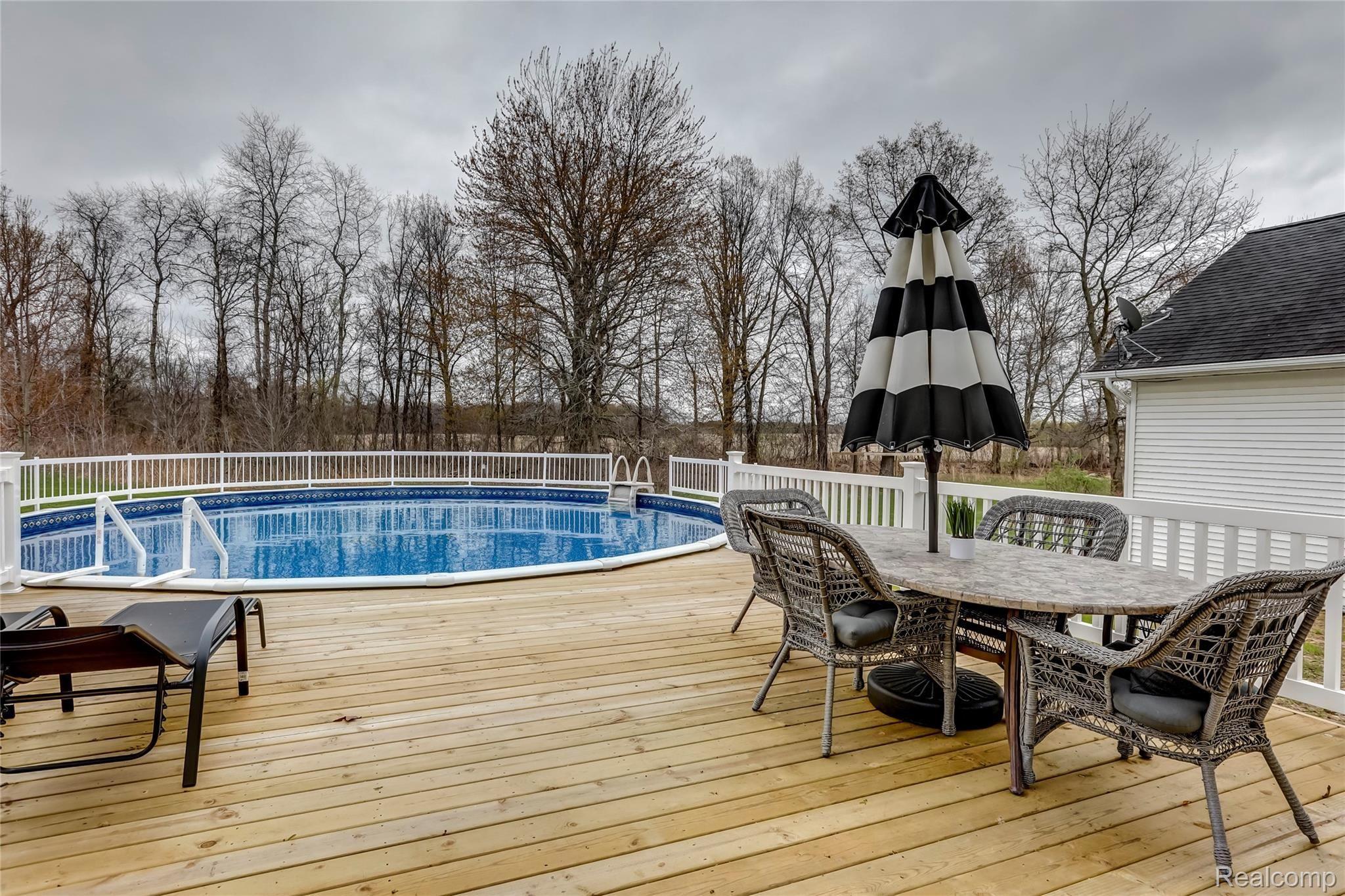 2695 Chilson Road Howell, MI 48843 - Photo 11 of 50 Spacious deck to relax or entertain your guests