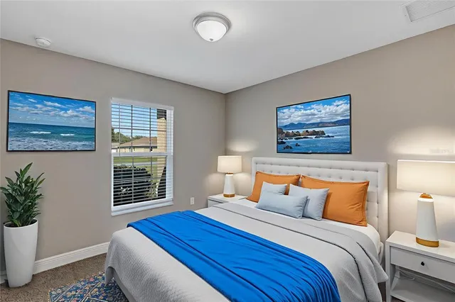 a kitchen with stainless steel appliances granite countertop a sink and a refrigerator