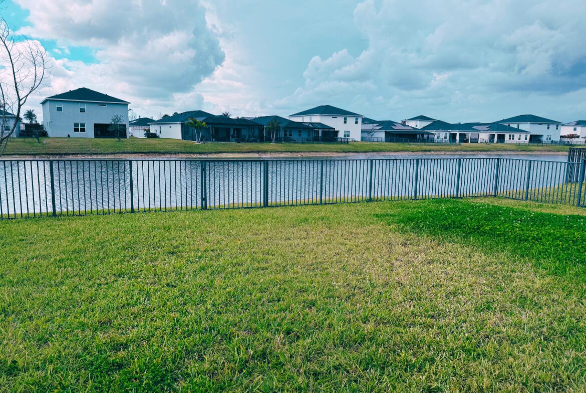 11024 Pacini Way Port St. Lucie, FL 34987 - Photo 16 of 16 a view of a yard with a small yard