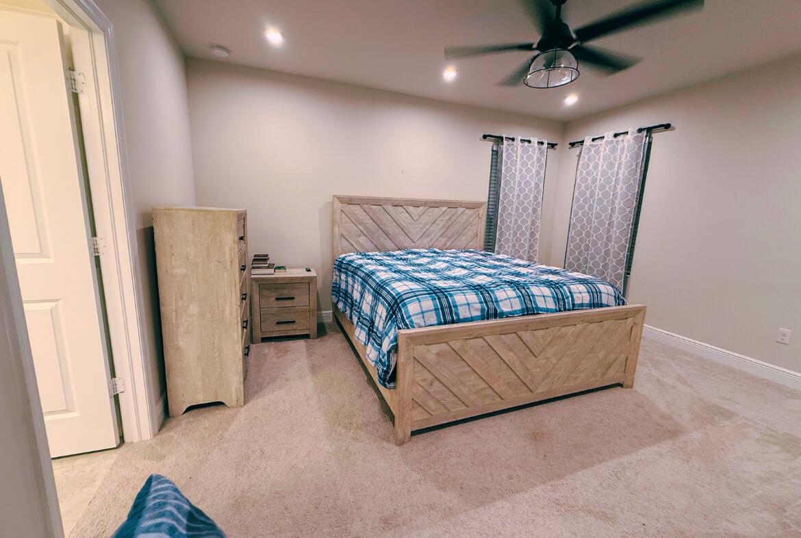 11024 Pacini Way Port St. Lucie, FL 34987 - Photo 2 of 16 a living room with furniture and a flat screen tv