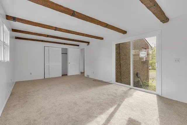 an empty room with windows