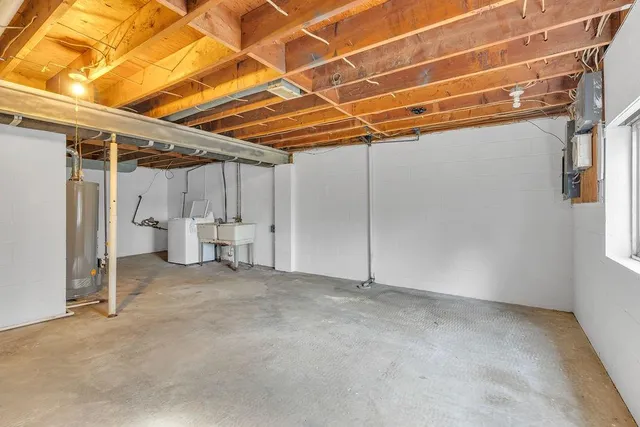 a view of empty room with wooden walls