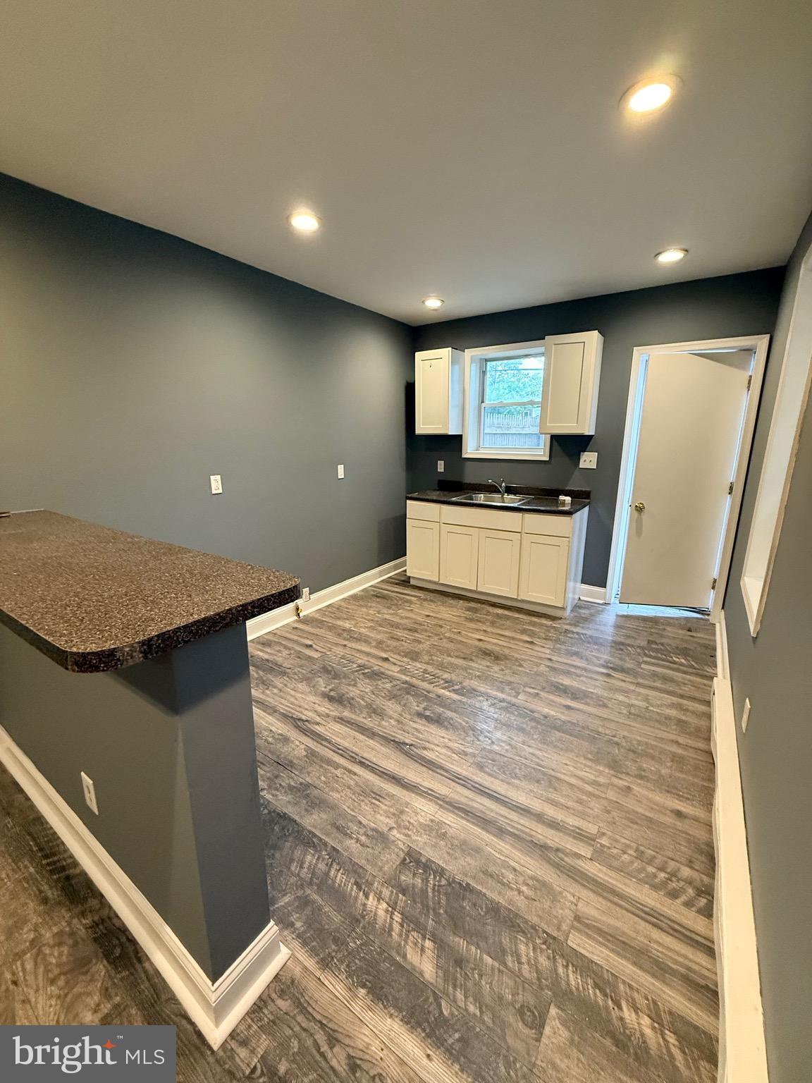 2324 North Lambert Street Philadelphia, PA 19132 - Photo 5 of 13 a large room with a large window