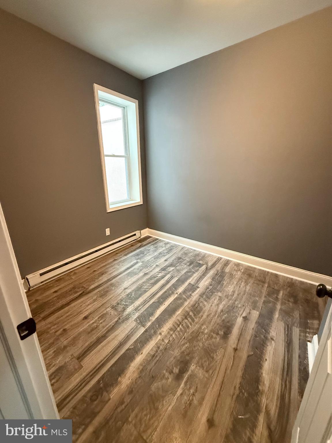 2324 North Lambert Street Philadelphia, PA 19132 - Photo 9 of 13 a view of empty room with wooden floor