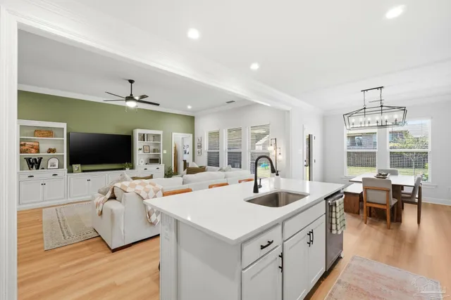 a bedroom with furniture and a window