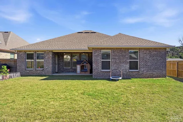an aerial view of a house having swimming pool