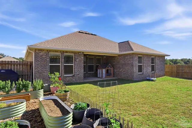 view of living room with a floor to ceiling window and wooden floor