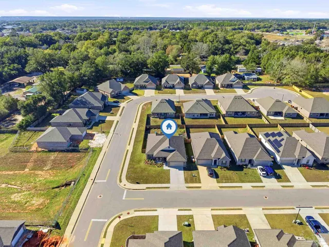 a view of a swimming pool with an outdoor space and seating area