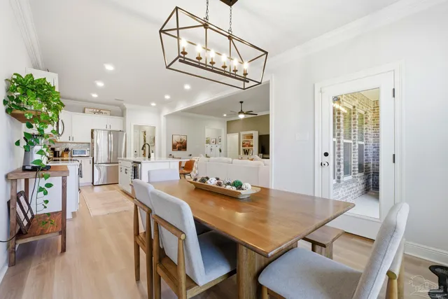 a kitchen with a sink stove and refrigerator