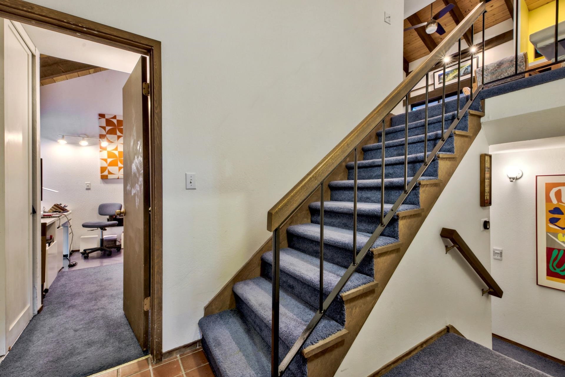 2755 North Lake Boulevard, Unit 9 Tahoe City, CA 96145 - Photo 4 of 21 a view of a hallway with wooden floor and stairs