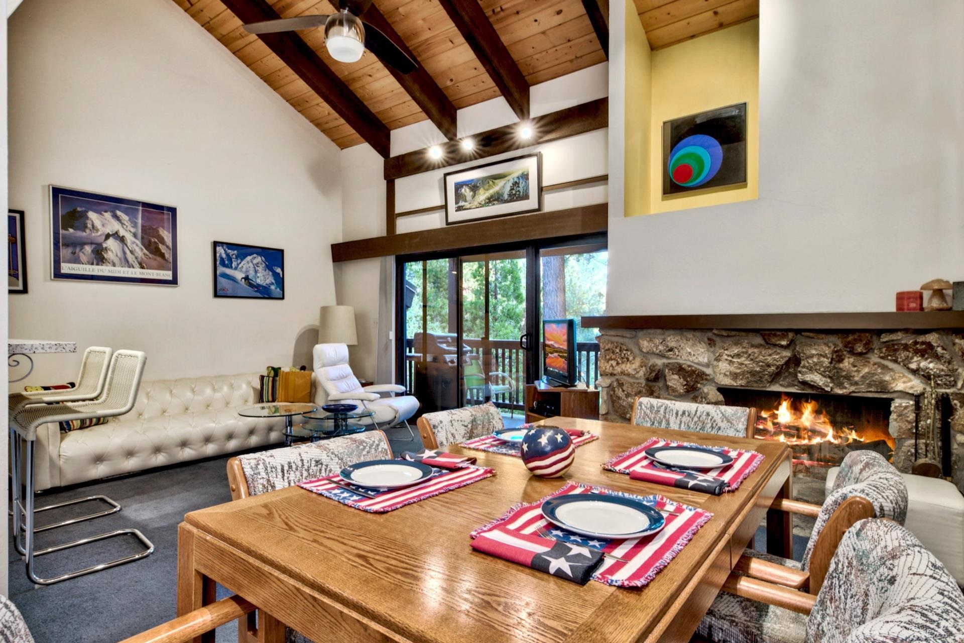 2755 North Lake Boulevard, Unit 9 Tahoe City, CA 96145 - Photo 8 of 21 a living room with furniture and a floor to ceiling window