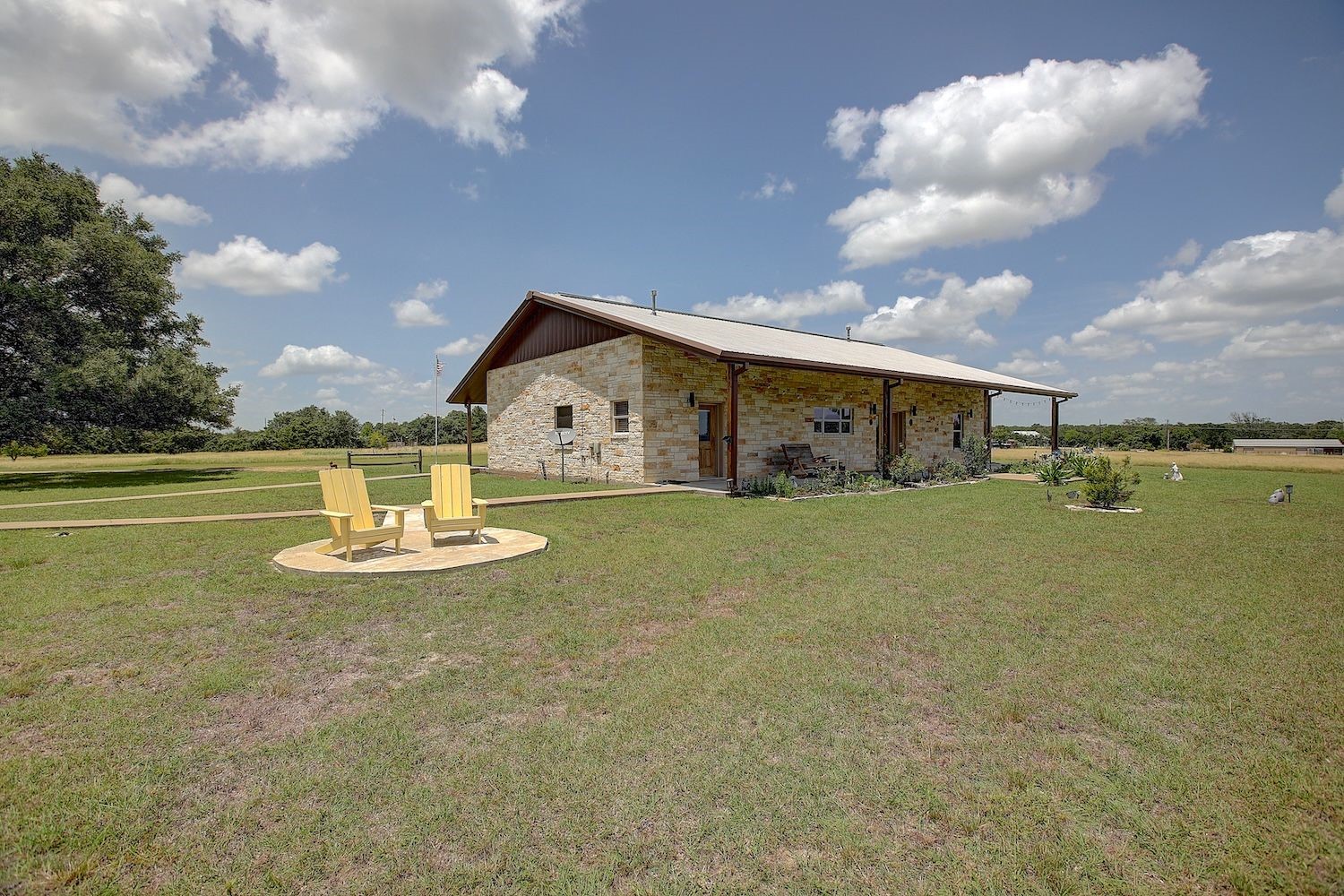 9414 Laird Road Round Top, TX 78954 - Photo 9 of 50 Seating area for sunset evenings relaxing into the pastoral views