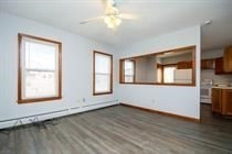 315 Woronoco Road Russell, MA 01071 - Photo 24 of 42 a view of an empty room with a window and wooden floor