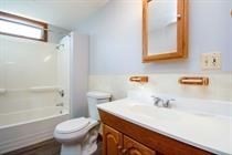 315 Woronoco Road Russell, MA 01071 - Photo 26 of 42 a bathroom with a sink toilet vanity and shower