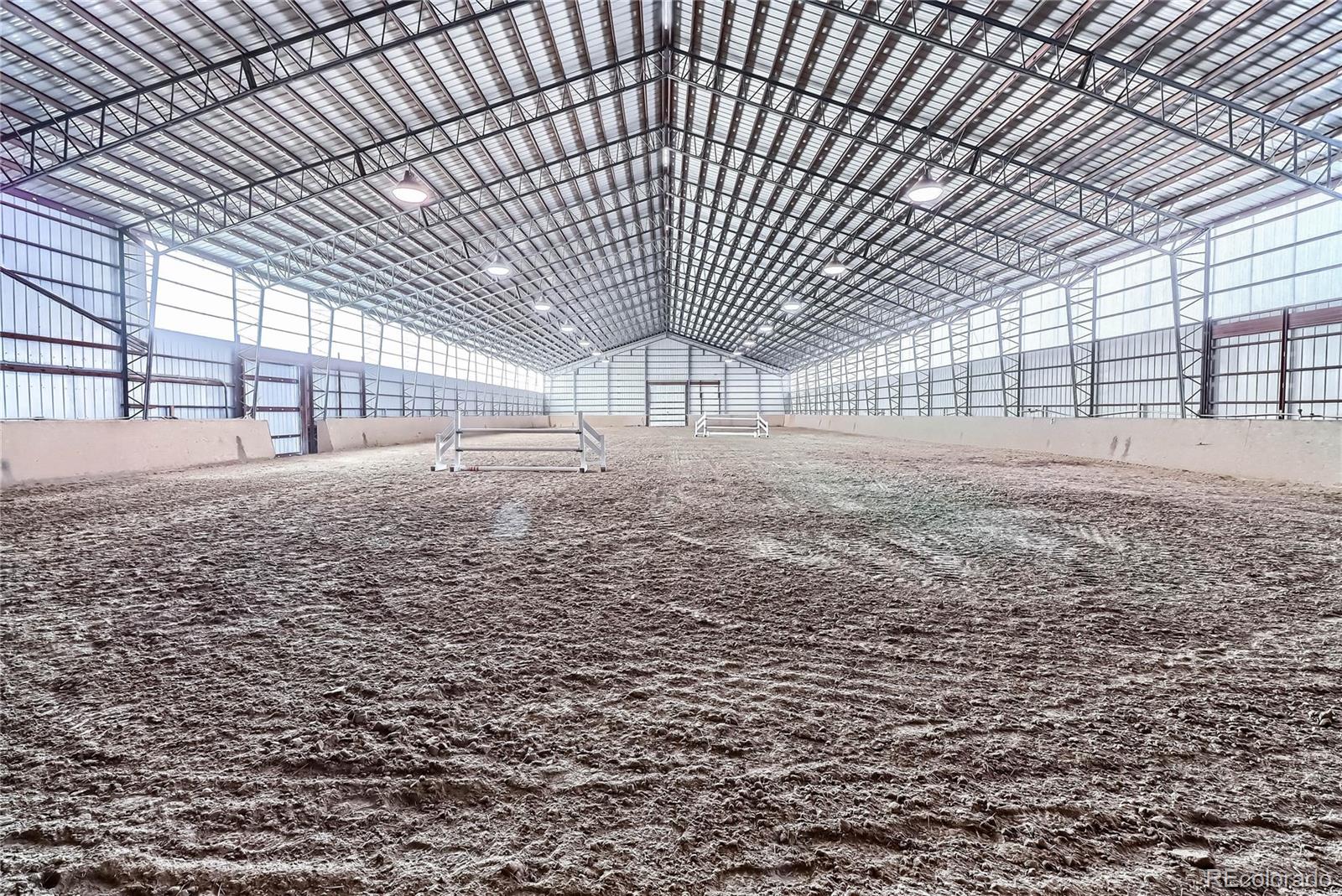40273 County Road 13 Elizabeth, CO 80107 - Photo 2 of 40 a big room with wooden walls
