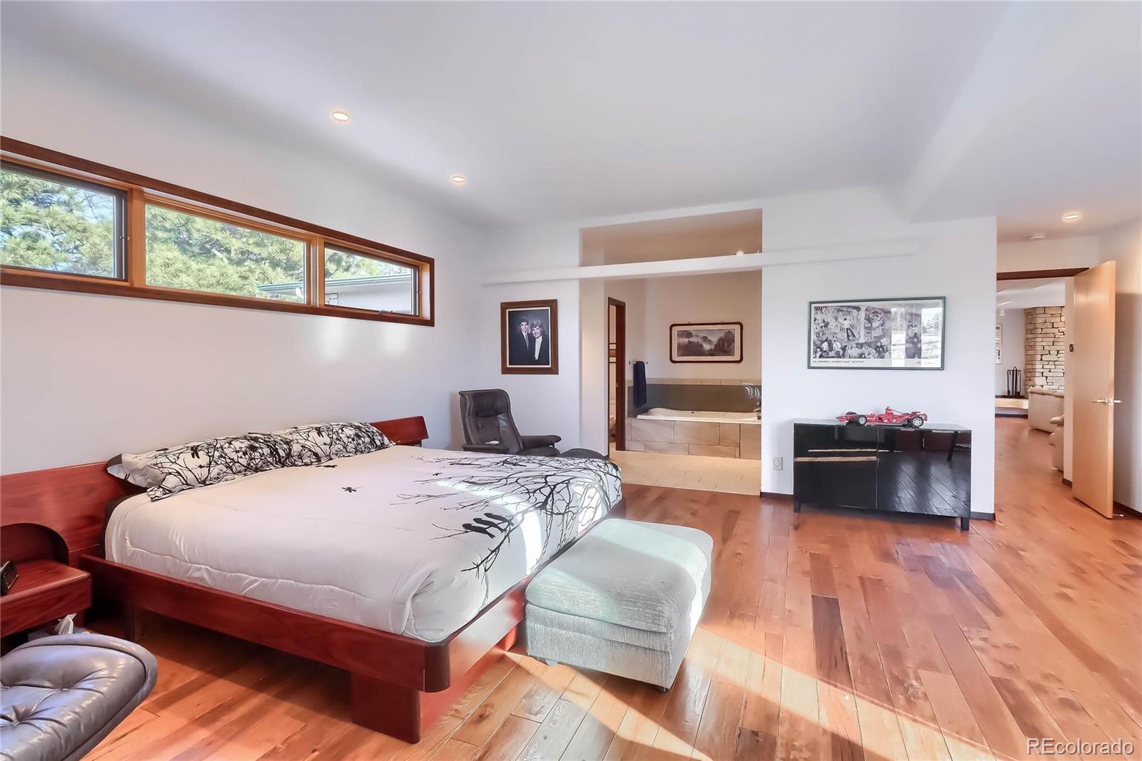 40273 County Road 13 Elizabeth, CO 80107 - Photo 28 of 40 a bedroom with a bed and a couch