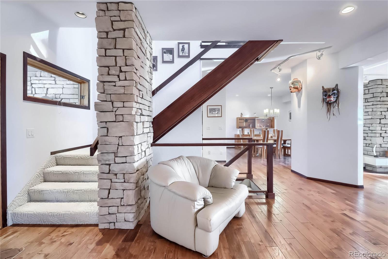 40273 County Road 13 Elizabeth, CO 80107 - Photo 33 of 40 a view of entryway and hall with wooden floor