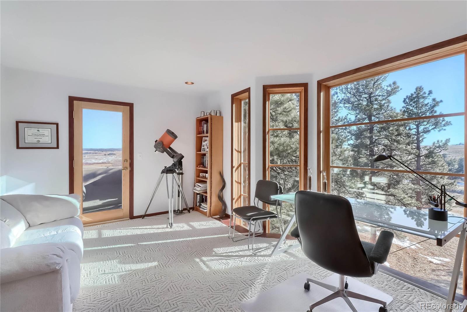 40273 County Road 13 Elizabeth, CO 80107 - Photo 37 of 40 a view of a livingroom with workspace