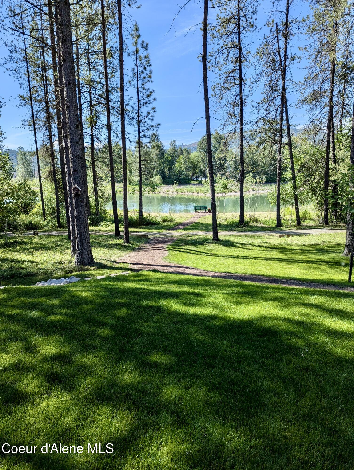 891 Ames Way Dover, ID 83825 - Photo 5 of 68 7 Lawn with Water in distance