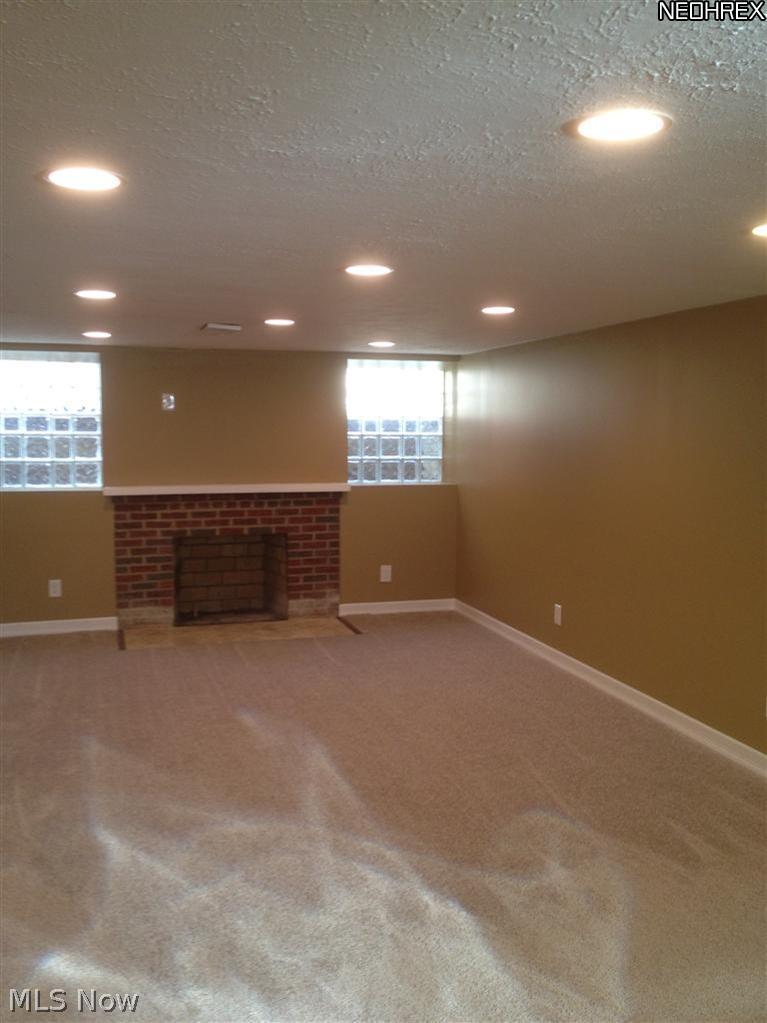 3825 Bushnell Road Cleveland, OH 44118 - Photo 18 of 25 Finished Basement with Fireplace