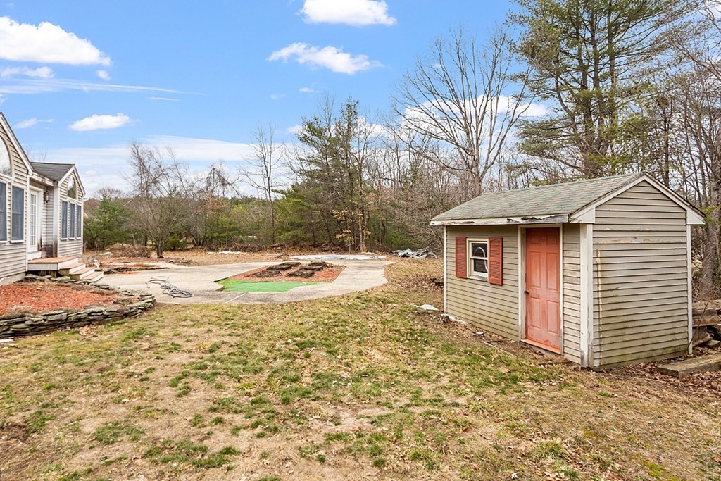 885 Townsend Road Groton, MA 01450 - Photo 4 of 39 a view of backyard of the house