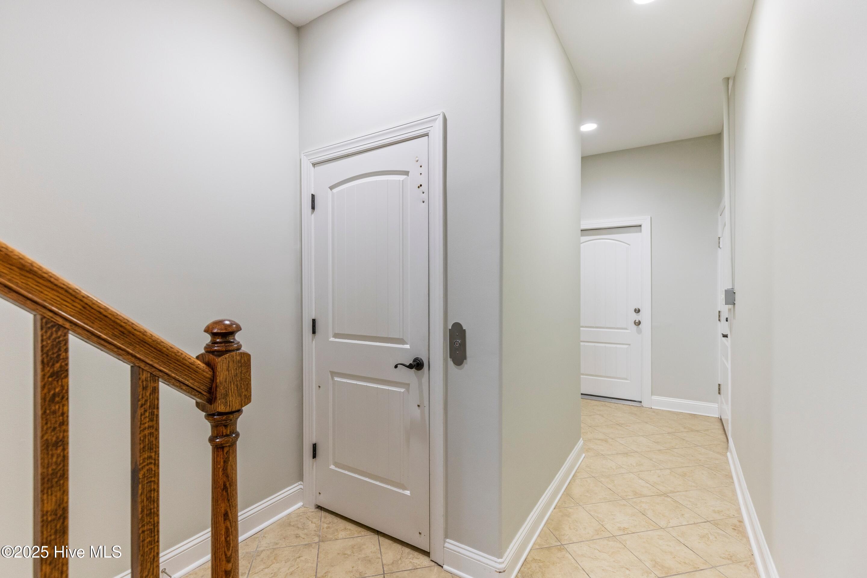 436 New River Inlet Road North Topsail Beach, NC 28460 - Photo 61 of 76 Ground level elevator, two garages, and 3 storage rooms