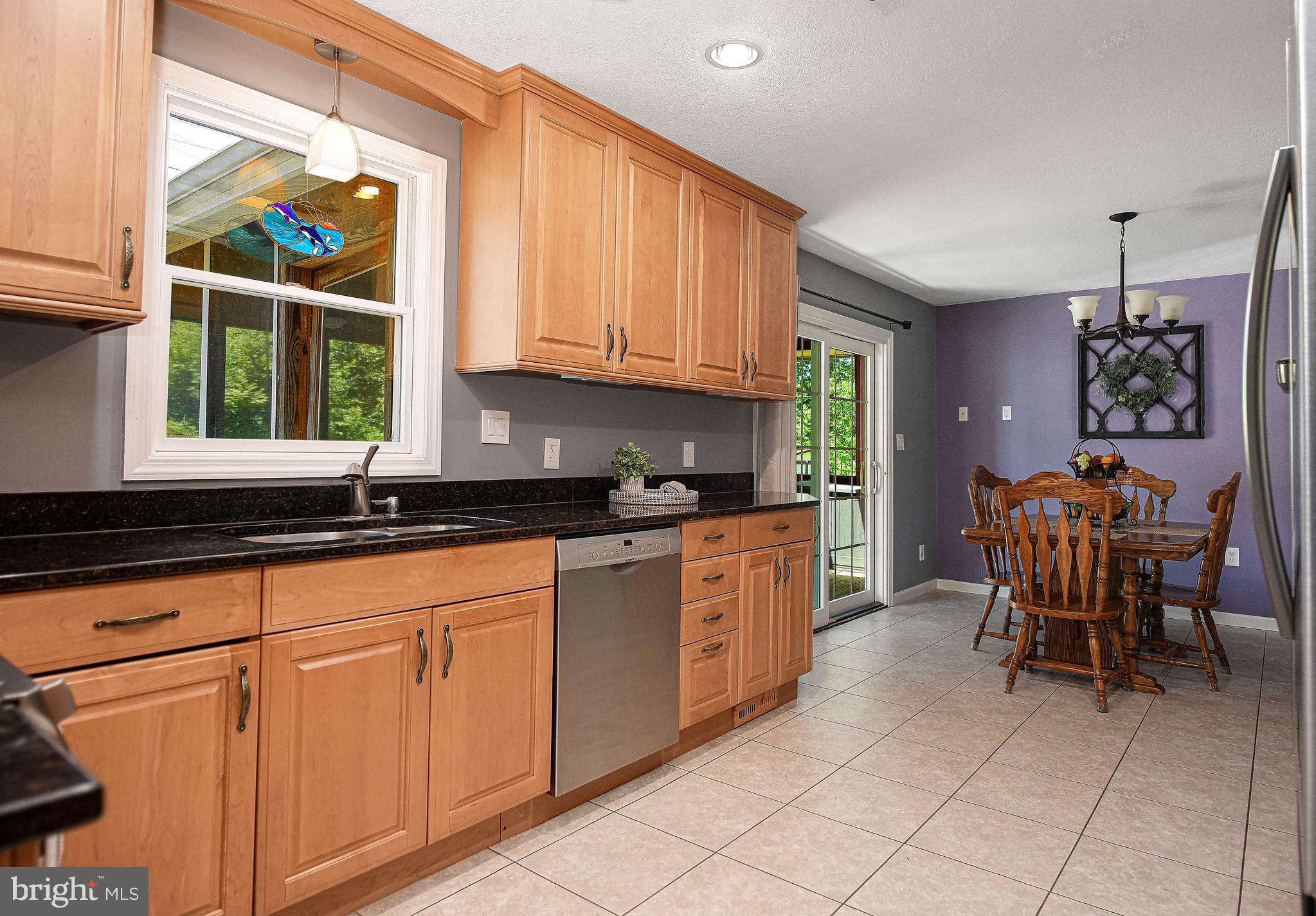 426 Gilmor Road Joppa, MD 21085 - Photo 13 of 42 Kitchen views with sliders to back porch