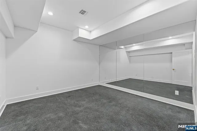 an empty room with a workbench