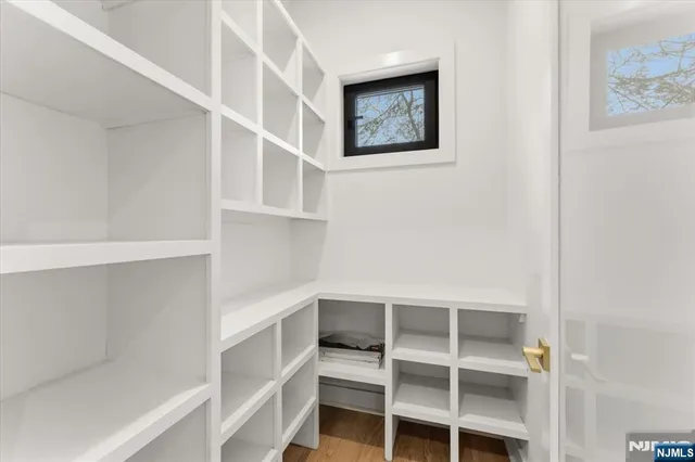 a view of an empty walk in closet