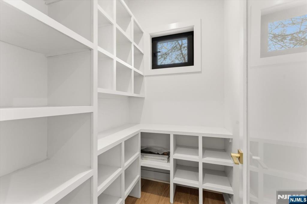 83 Falcon Road Livingston, NJ 07039 - Photo 16 of 34 a view of an empty walk in closet