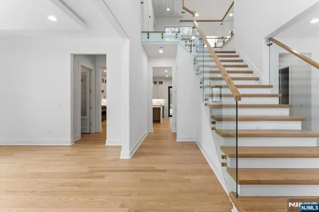 a view of a hallway view with staircase