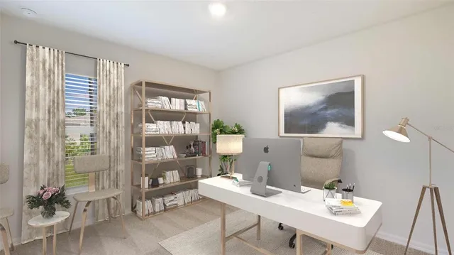 a view of a livingroom with furniture and window