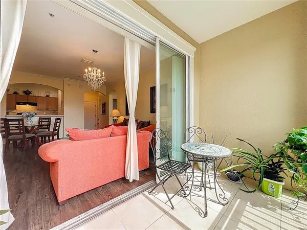 a living room with furniture and a table