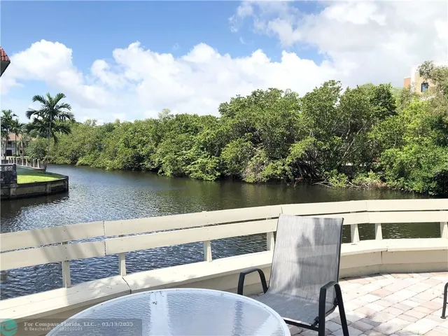 a view of a lake from a terrace