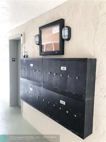 a bathroom with a bathtub and a mirror
