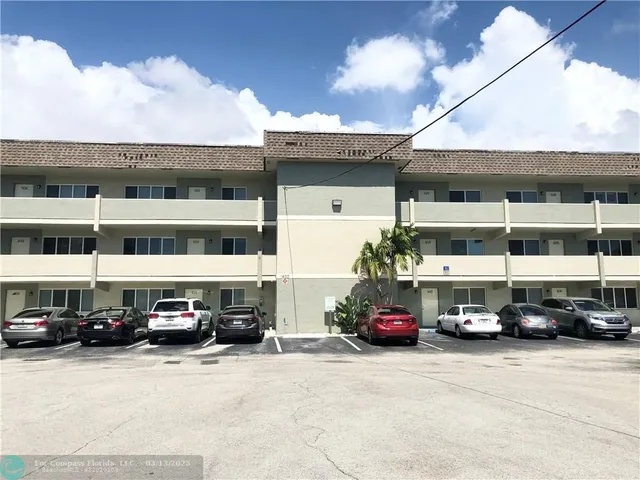 a car parked in front of a building