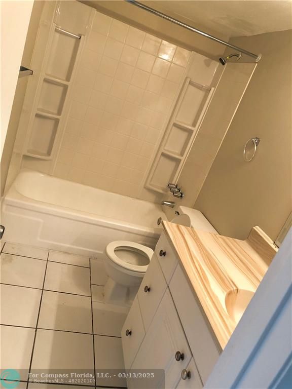 1400 Northeast 54th Street, Unit 203 Fort Lauderdale, FL 33334 - Photo 4 of 19 a view of a walk in closet