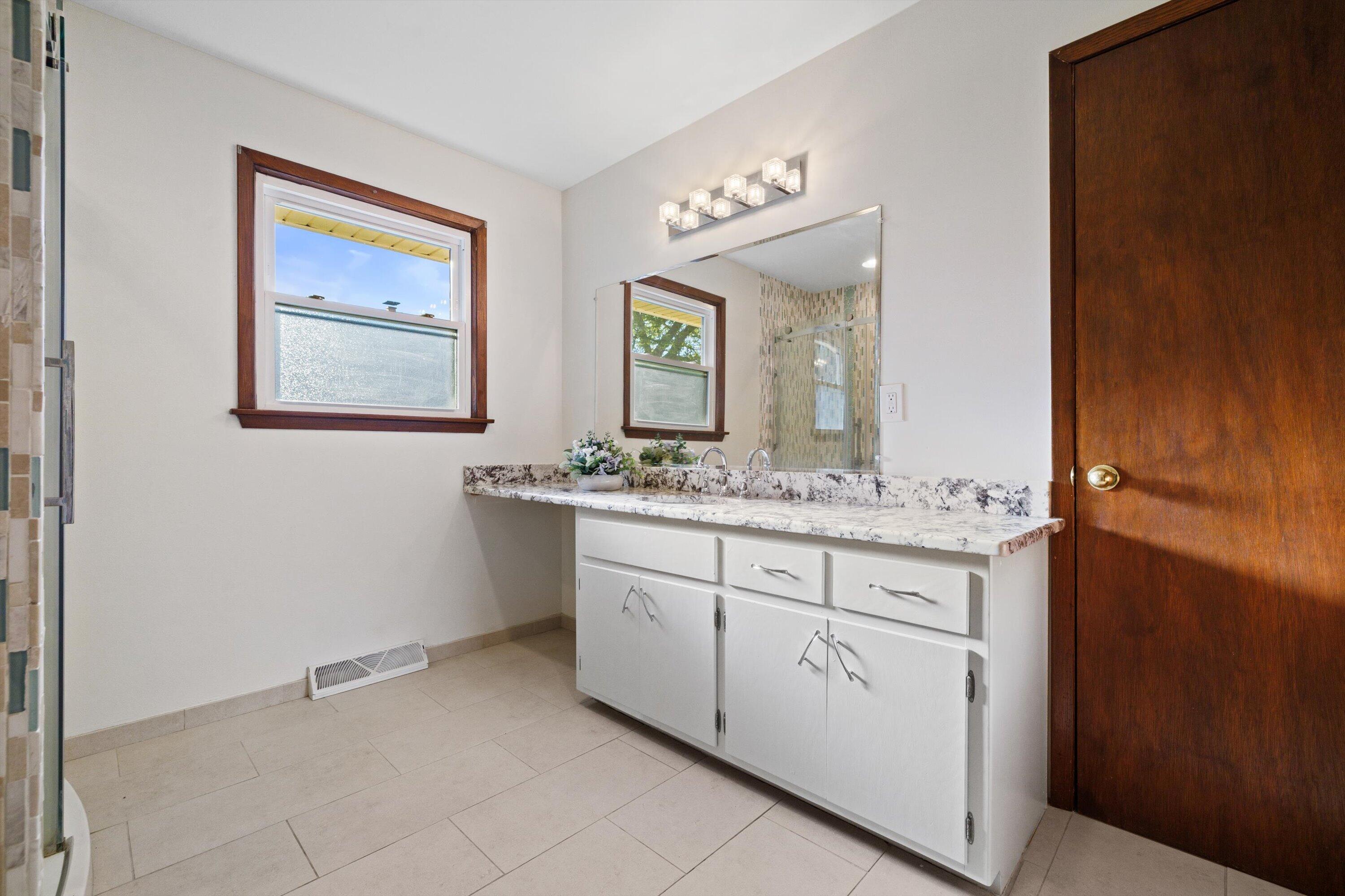726 Royal Park Road Caledonia, WI 53402 - Photo 25 of 29 Bright bathroom with natural light and a clean, refreshed feel
