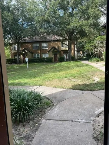 a house view with a garden space