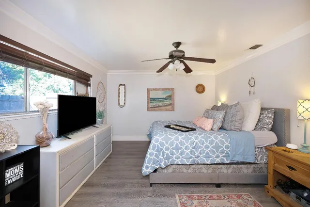 a bathroom with a sink toilet and mirror