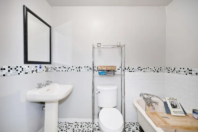 a bathroom with a sink and a toilet